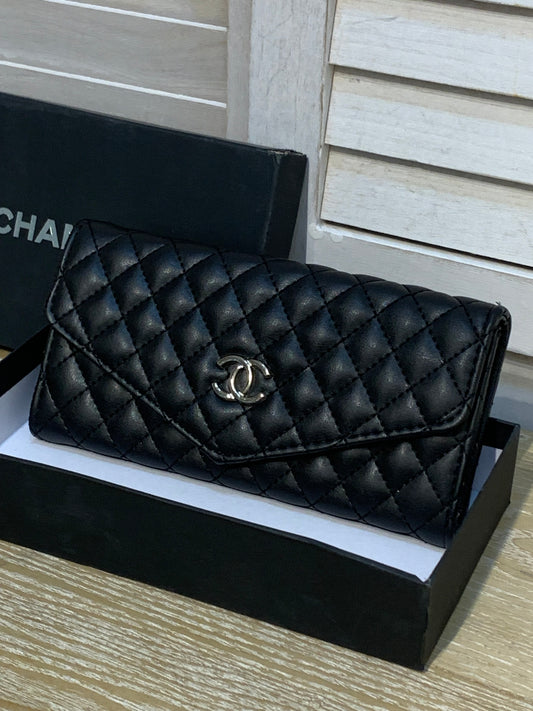 Black Chanel purse with box