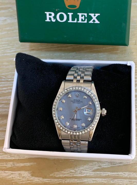 ‏Rolex watch, silver and sky blue, with box